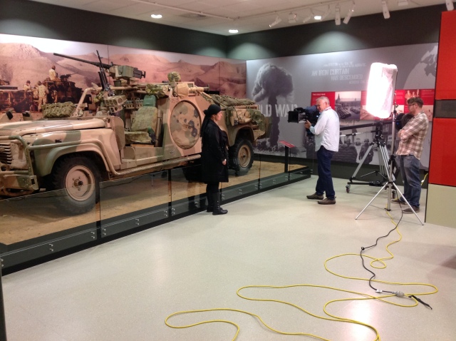 Fatima Killeen filming in the Conflicts 1945 to Today exhibition at the Australian War Memorial