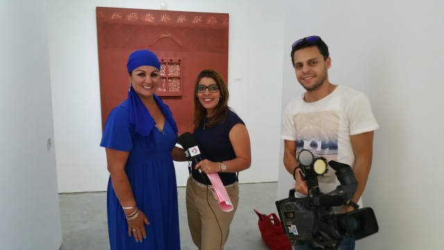 Fatima Killeen after an interview with the film crew from 2M TV at the MAC-A Gallery located on the beachfront in Asilah, Morocco.